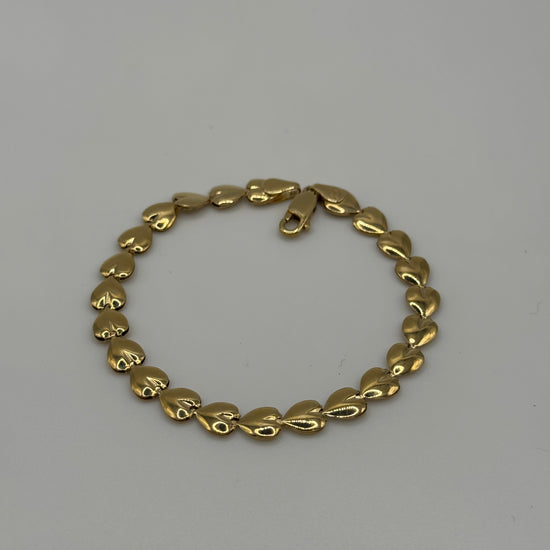 7-inch 14k gold link bracelet with 5.8mm width and 5.5g weight, featuring a polished jewelry design from Chique Jewelry.