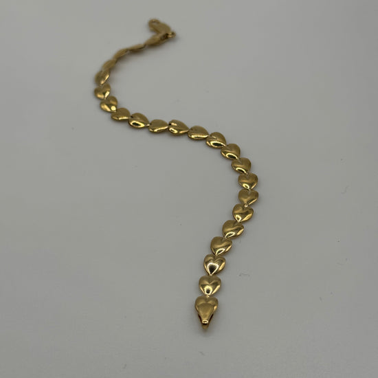 14k gold 7-inch 5.8mm link bracelet by Chique Jewelry, featuring a polished gold finish and secure clasp.