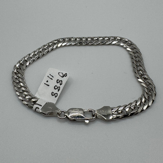 7.25-inch 14k white gold chain bracelet with 5.8mm links, weighing 11.1 grams, by Chique Jewelry.