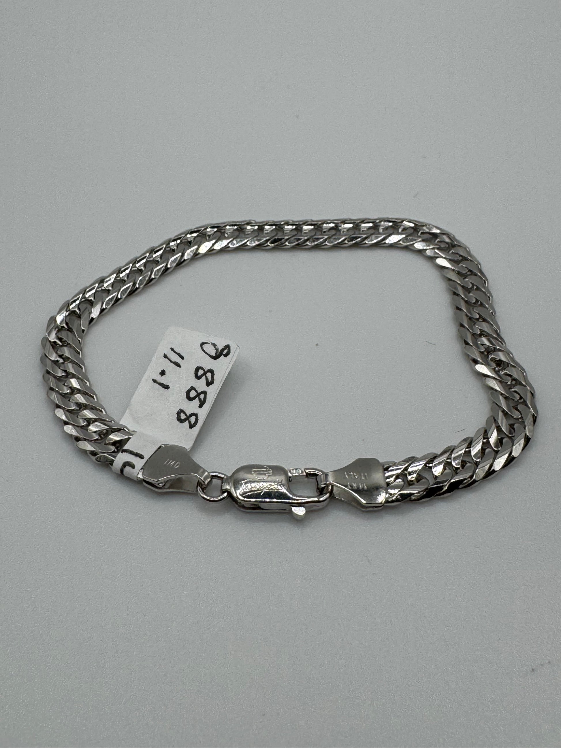 7.25-inch 14k white gold chain bracelet with 5.8mm links, weighing 11.1 grams, by Chique Jewelry.