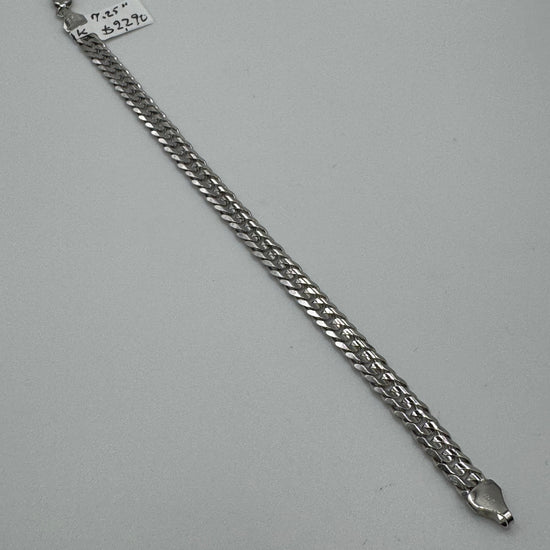 7.25-inch 14k white gold chain bracelet with 5.8mm links, designed by Chique Jewelry, weighing 11.1 grams.