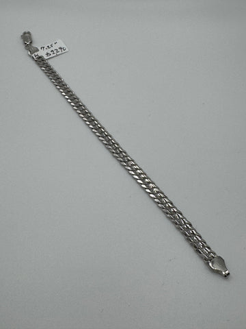 7.25-inch 14k white gold chain bracelet with 5.8mm links, designed by Chique Jewelry, weighing 11.1 grams.
