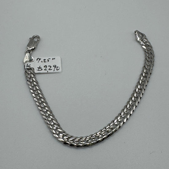 7.25-inch 14k white gold chain bracelet with 5.8mm links, weighing 11.1 grams, by Chique Jewelry.