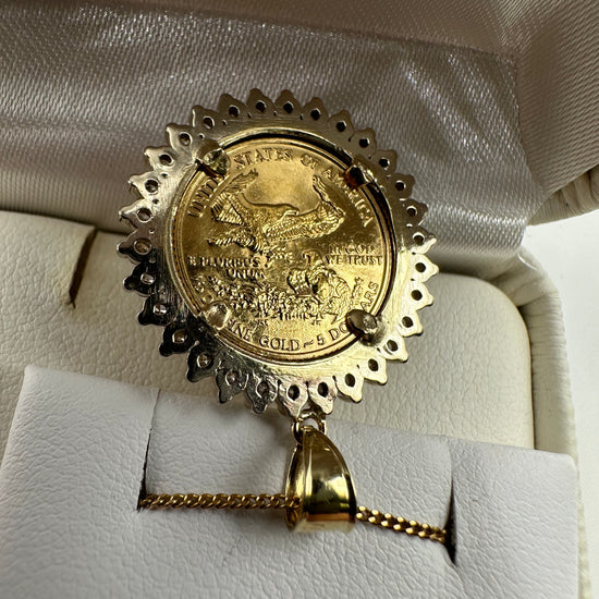 Liberty coin pendant by Chique Jewelry, 22k gold with 1ct natural diamonds, H-SI2 clarity, weighs 7.4g, detailed close-up image
