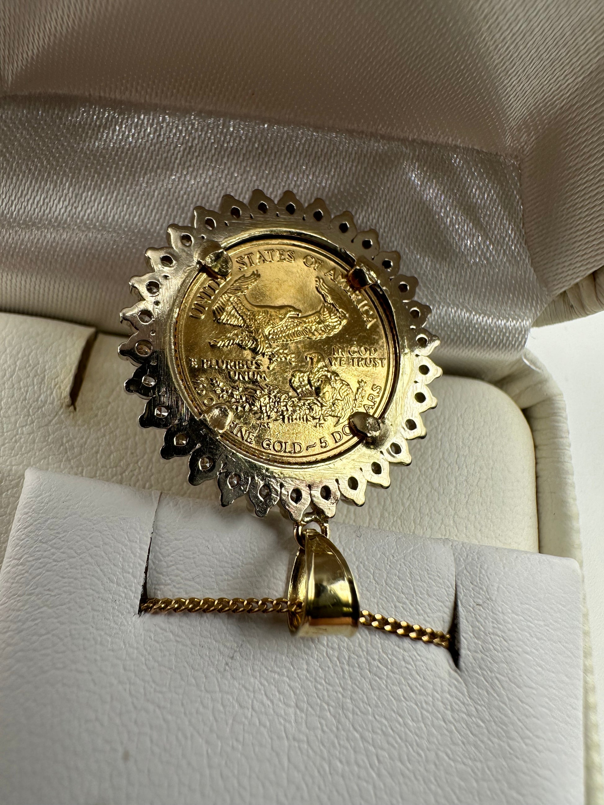 Liberty coin pendant by Chique Jewelry, 22k gold with 1ct natural diamonds, H-SI2 clarity, weighs 7.4g, detailed close-up image