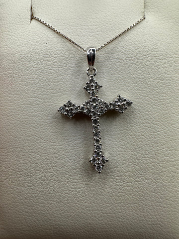 Sterling silver diamond cross pendant with 0.50 ct VVS diamonds, weighing 2 grams, from Chique Jewelry.