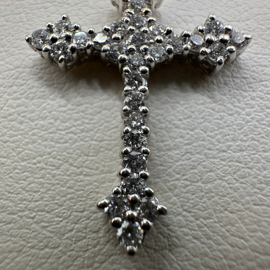 Sterling silver diamond cross pendant with 0.50 ct VVS diamonds, elegant jewelry piece, weighs 2 grams, from Chique Jewelry.