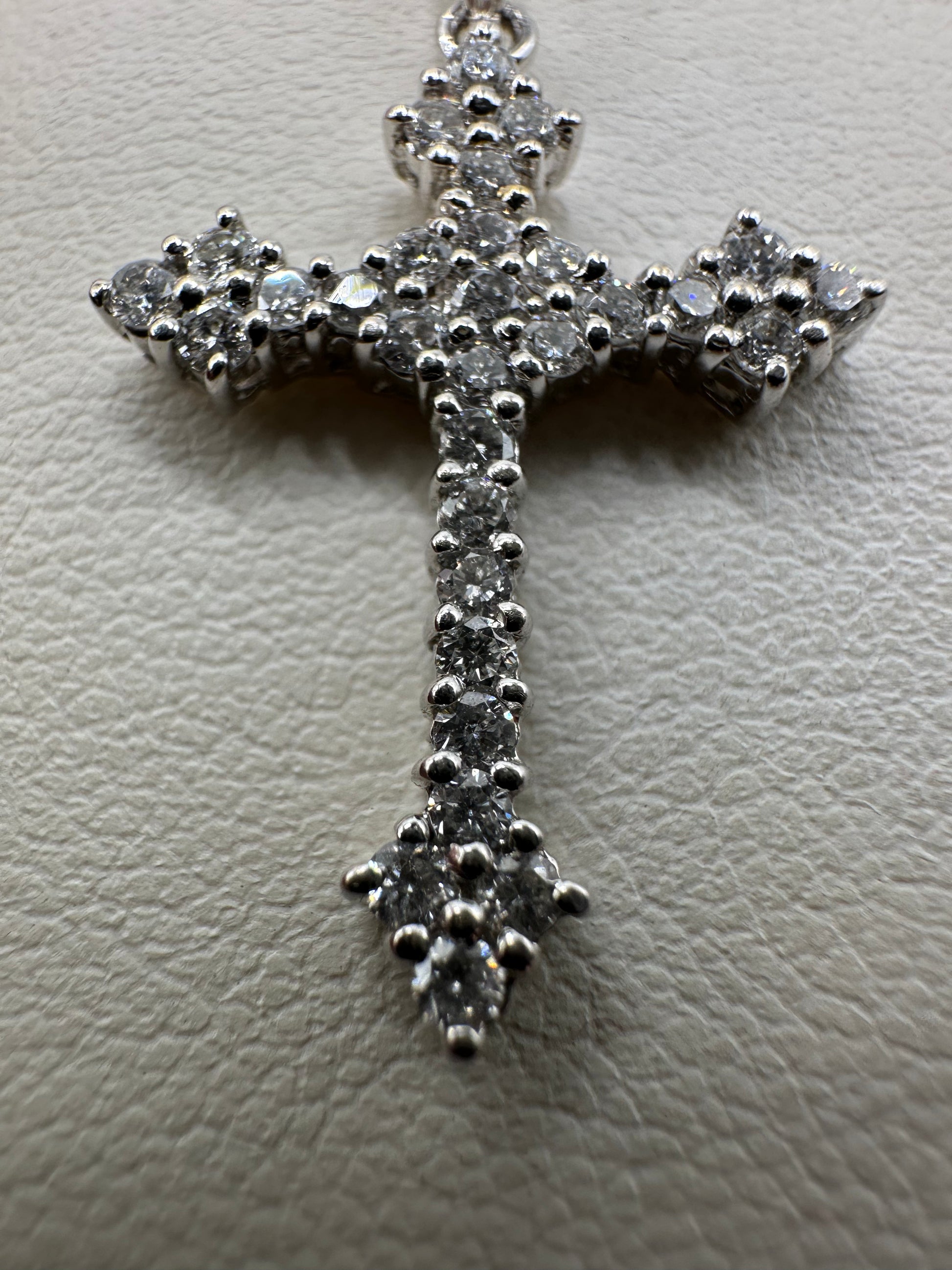 Sterling silver diamond cross pendant with 0.50 ct VVS diamonds, elegant jewelry piece, weighs 2 grams, from Chique Jewelry.